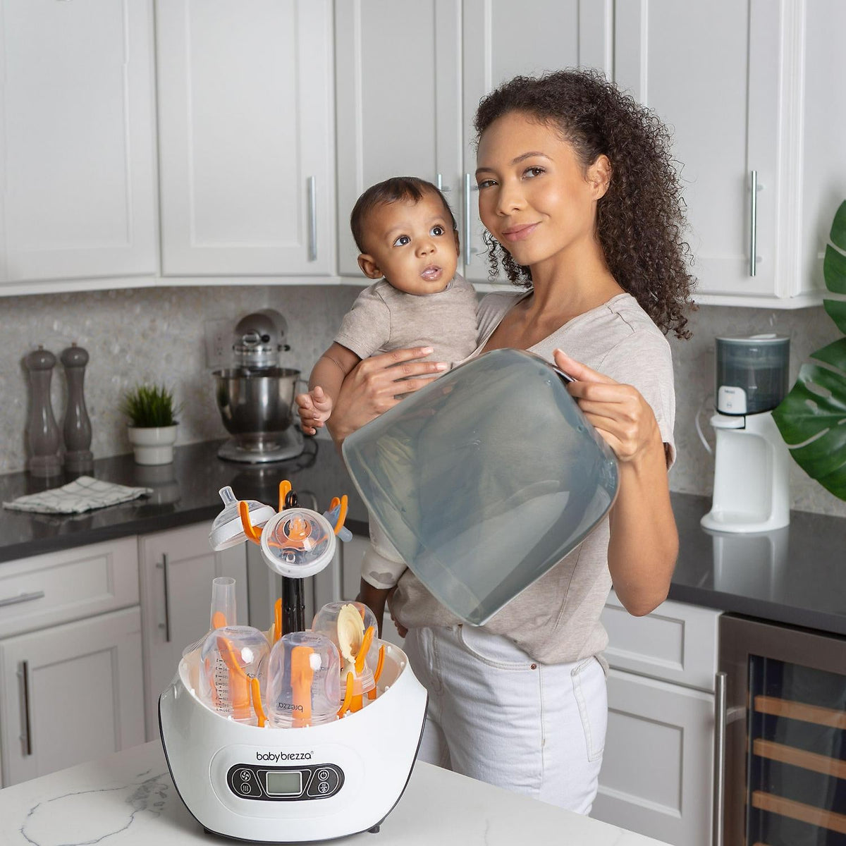 Baby Brezza Baby Bottle Sterilizer and Dryer Machine Electric Steam Sterilization - Pacifiers. Glass. Plastic. and Newborn Feeding Bottles